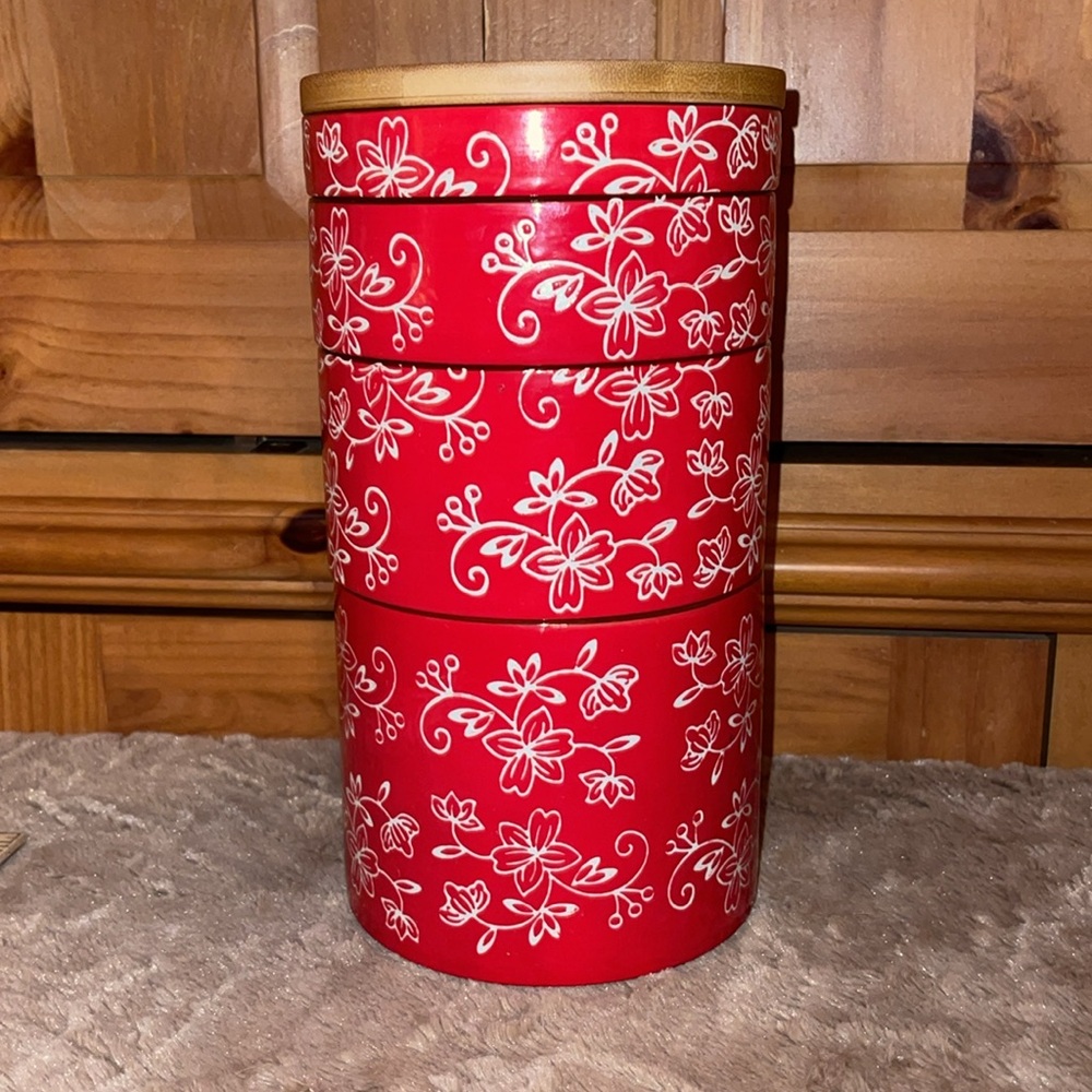 Temptations red floral lace stackable canister set/wood top. 4,11,20 & 35 oz.